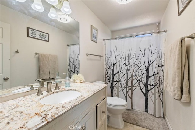 full bathroom with a shower with shower curtain, tile patterned floors, vanity, and toilet