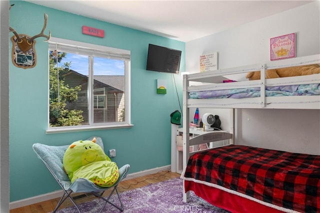 bedroom with baseboards