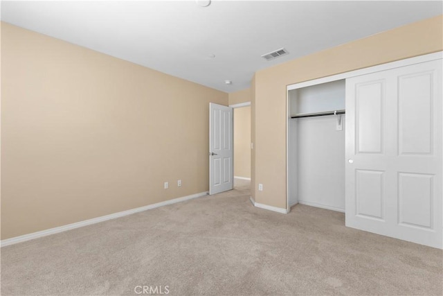 17938 Caraway Ct, San Bernardino, CA 92407 - unfurnished bedroom with a closet, light colored carpet, baseboards, and visible vents