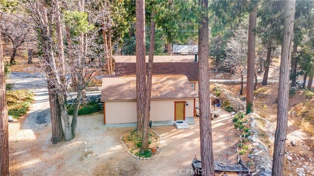 view of front of house featuring a shingled roof