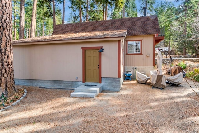 view of outbuilding with entry steps