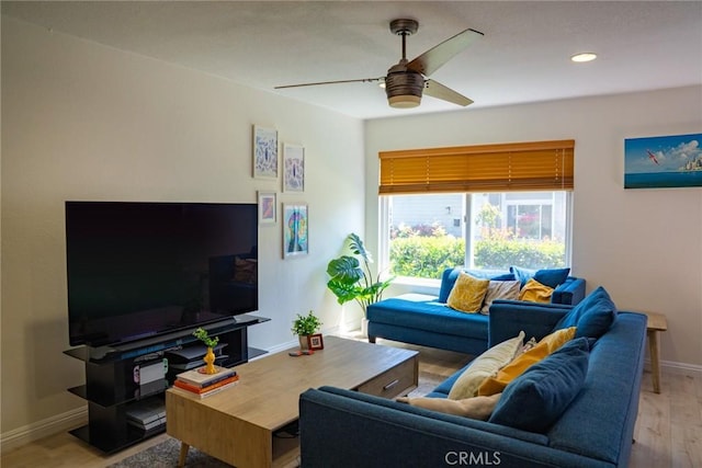 54 Oval Rd Unit 3, Irvine, CA 92604 - living room with a ceiling fan, baseboards, wood finished floors, and recessed lighting