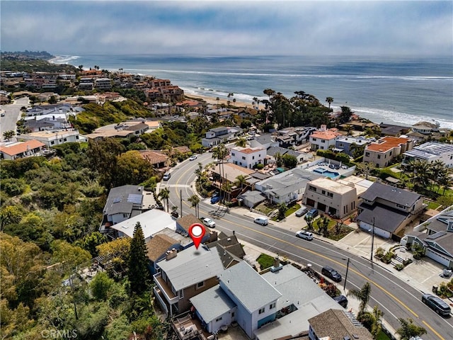 bird's eye view featuring a water view and a residential view