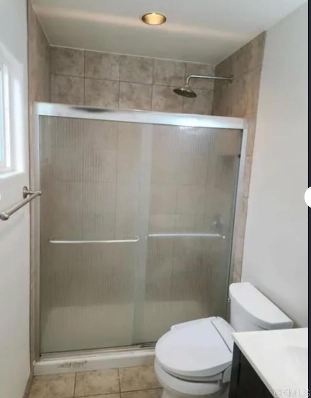 554 Taylor St, Vista, CA 92084 - bathroom with vanity, a shower stall, and tile patterned flooring