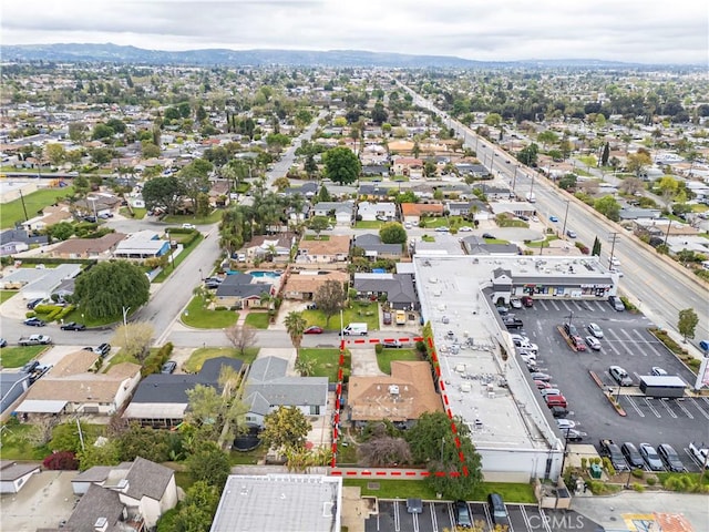 aerial view with a mountain view and a residential view
