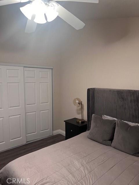 2899 Amber Dr, Corona, CA 92882 - bedroom with dark wood-type flooring, a closet, baseboards, and ceiling fan
