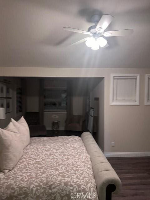 2899 Amber Dr, Corona, CA 92882 - bedroom with wood finished floors, baseboards, and ceiling fan