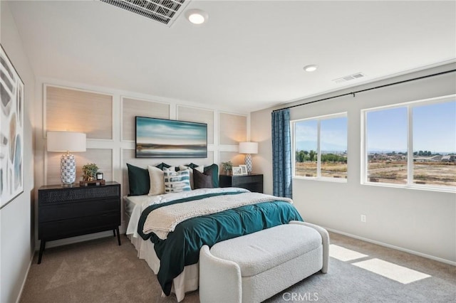 bedroom with recessed lighting, carpet flooring, visible vents, and baseboards