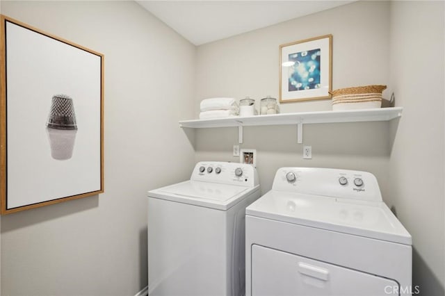 laundry room with laundry area and washing machine and dryer