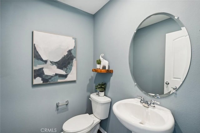 bathroom featuring a sink and toilet