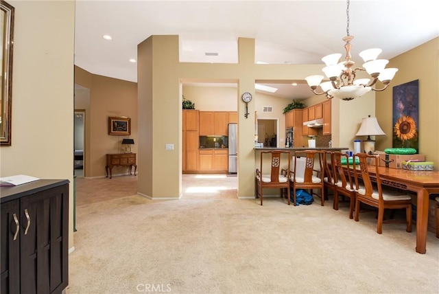 24182 Via Llano, Murrieta, CA 92562 - dining space with a chandelier, light carpet, lofted ceiling, and recessed lighting