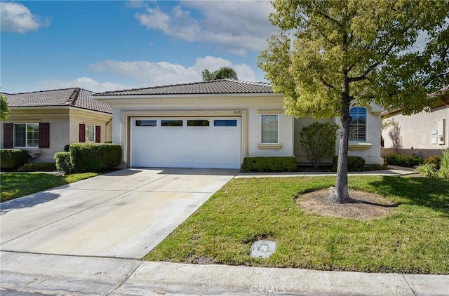 24182 Via Llano, Murrieta, CA 92562 - view of front of house with a tile roof, an attached garage, concrete driveway, and stucco siding