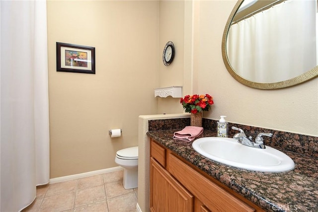 24182 Via Llano, Murrieta, CA 92562 - full bath with toilet, vanity, tile patterned flooring, and baseboards