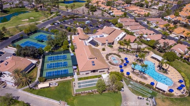 24182 Via Llano, Murrieta, CA 92562 - aerial perspective of suburban area with a pool area, a nearby body of water, and a golf club