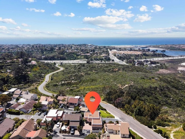 aerial view featuring a water view and a residential view