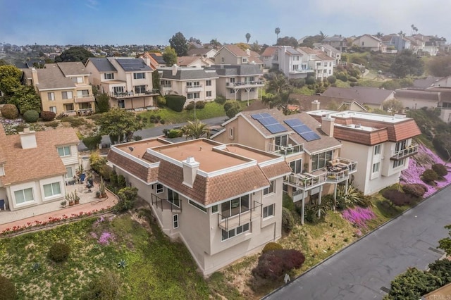 birds eye view of property with a residential view