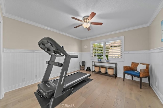 351 W Northridge Ave, Glendora, CA 91741 - workout area with hardwood / wood-style floors, ceiling fan, crown molding, and a wainscoted wall
