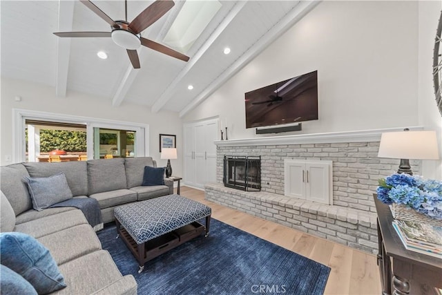 351 W Northridge Ave, Glendora, CA 91741 - living area featuring wood finished floors, ceiling fan, beamed ceiling, and a fireplace