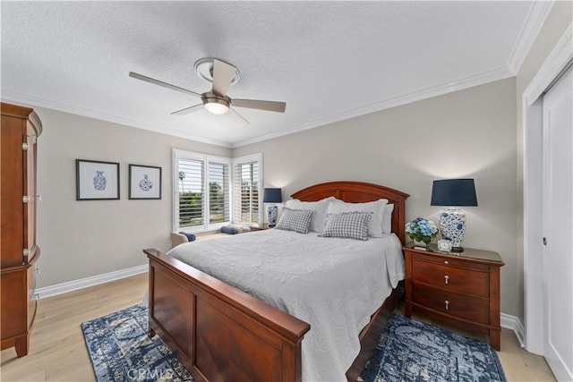 351 W Northridge Ave, Glendora, CA 91741 - bedroom with a closet, baseboards, ornamental molding, a textured ceiling, and light wood finished floors