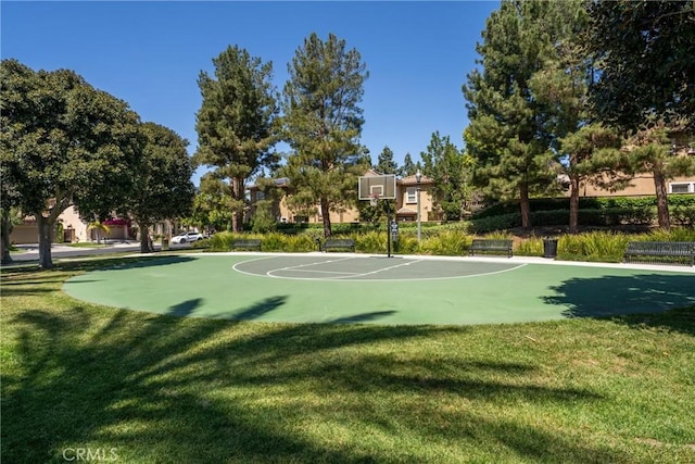 view of sport court with community basketball court and a yard