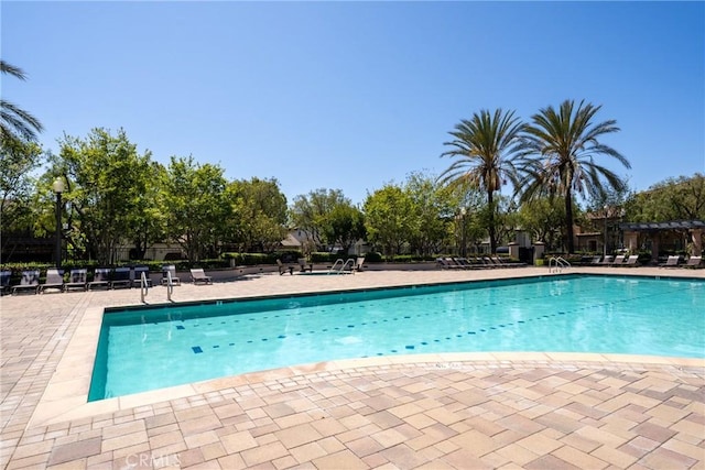 pool with a patio
