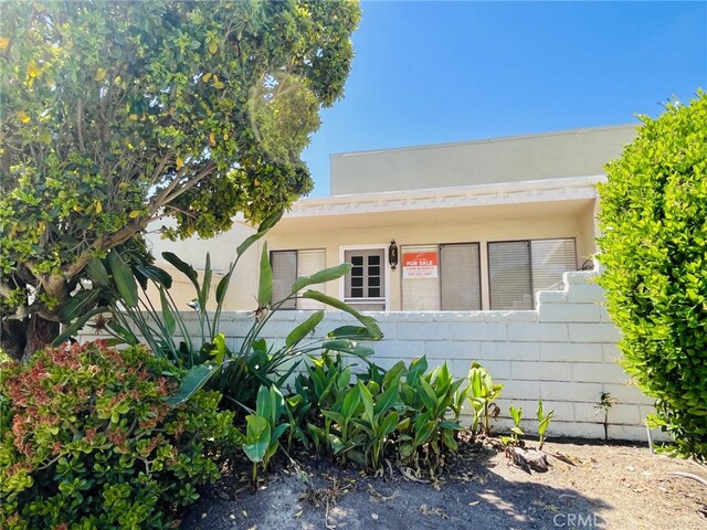 2019 Via Mariposa W Unit G, Laguna Woods, CA 92637 - view of front of house with fence