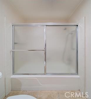 2019 Via Mariposa W Unit G, Laguna Woods, CA 92637 - bathroom with toilet and bath / shower combo with glass door