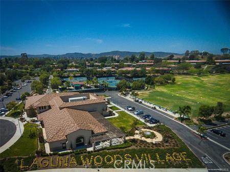 2019 Via Mariposa W Unit G, Laguna Woods, CA 92637 - view from above of property with a mountain backdrop