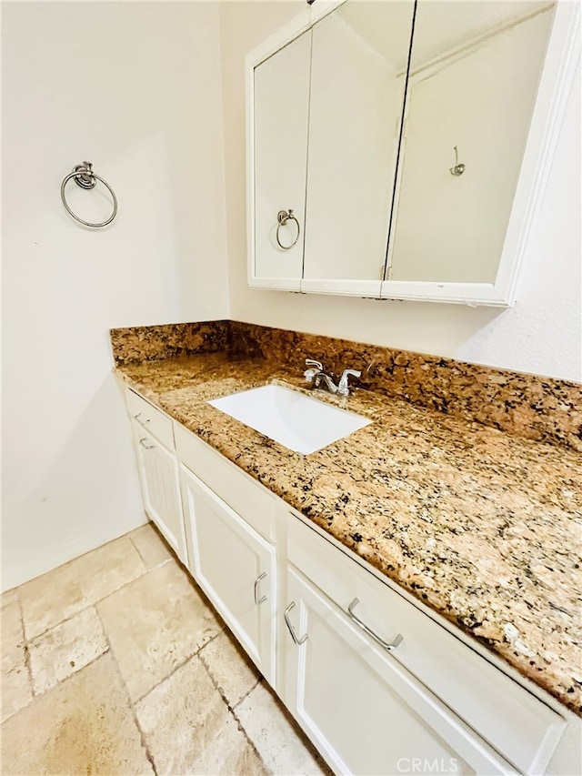 2019 Via Mariposa W Unit G, Laguna Woods, CA 92637 - bathroom featuring vanity and stone tile flooring