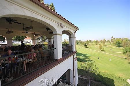 2019 Via Mariposa W Unit G, Laguna Woods, CA 92637 - wooden terrace featuring ceiling fan, view of golf course, and a yard