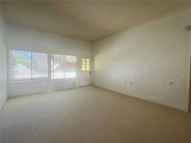 2019 Via Mariposa W Unit G, Laguna Woods, CA 92637 - empty room with carpet flooring and ornamental molding