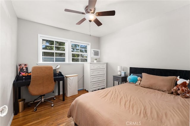 bedroom featuring ceiling fan and wood finished floors