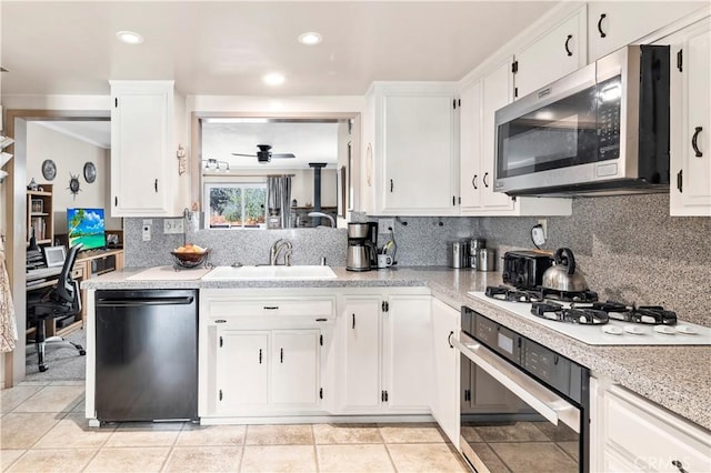 250 N Wateka St, San Jacinto, CA 92583 - kitchen featuring appliances with stainless steel finishes, a sink, a ceiling fan, light countertops, and white cabinets
