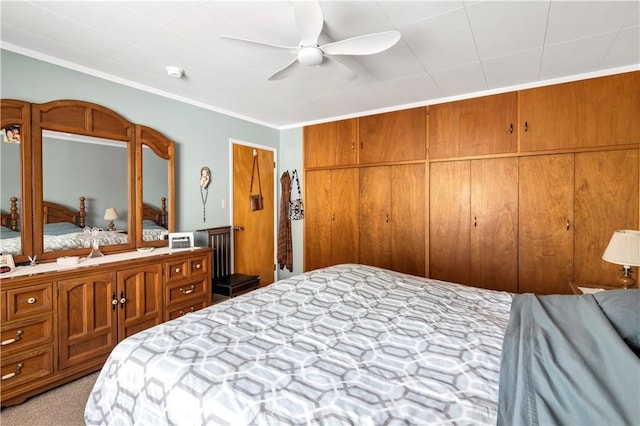 250 N Wateka St, San Jacinto, CA 92583 - bedroom with crown molding, light carpet, and a ceiling fan