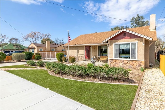 250 N Wateka St, San Jacinto, CA 92583 - ranch-style house with a chimney, roof with shingles, stucco siding, and a porch