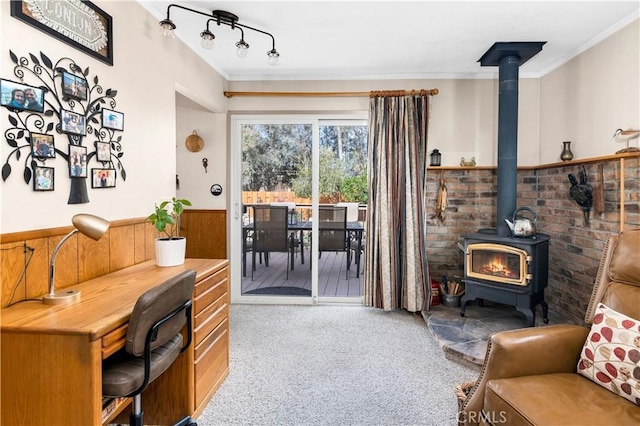250 N Wateka St, San Jacinto, CA 92583 - office area featuring a wood stove, carpet floors, ornamental molding, and a wainscoted wall