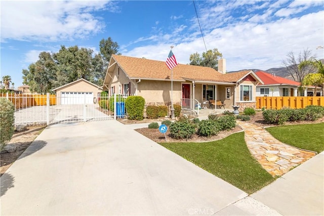 250 N Wateka St, San Jacinto, CA 92583 - ranch-style house featuring stucco siding, a gate, a chimney, a porch, and an outbuilding