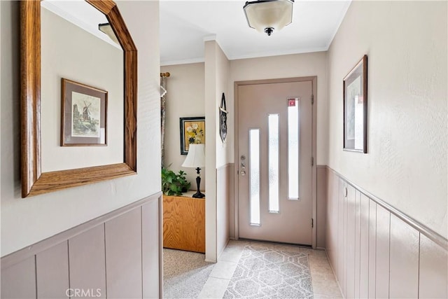 250 N Wateka St, San Jacinto, CA 92583 - foyer with wainscoting, crown molding, and a decorative wall