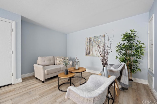 8731 Graves Ave Unit 13, Santee, CA 92071 - living area with wood finished floors and baseboards