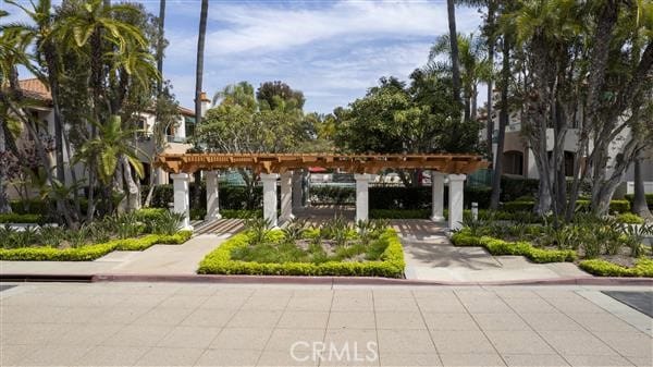 surrounding community with a pergola