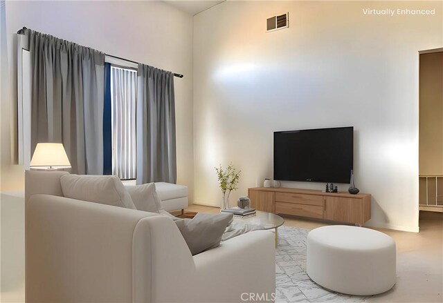 living room featuring visible vents