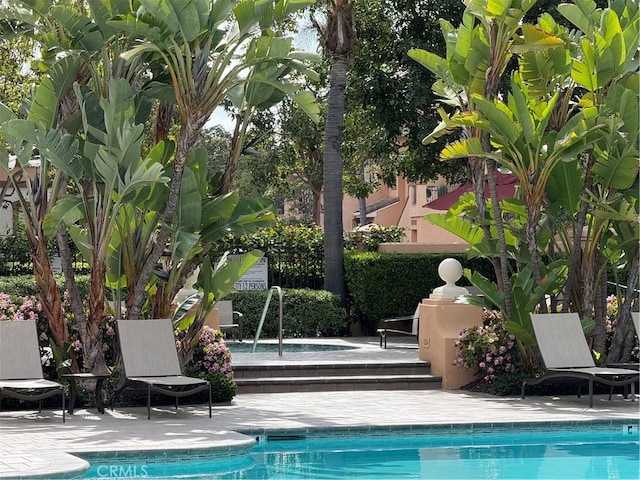 pool with a patio area