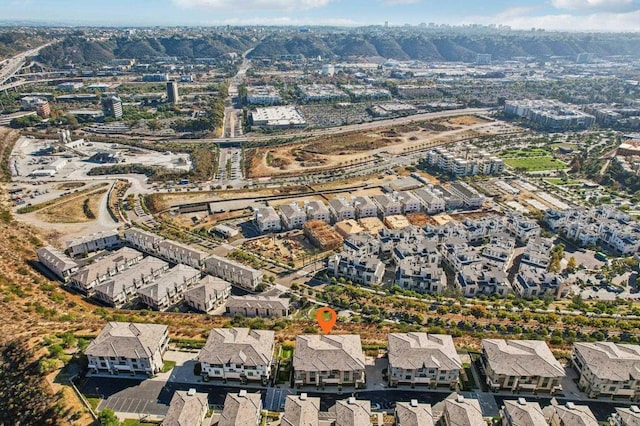birds eye view of property with a residential view