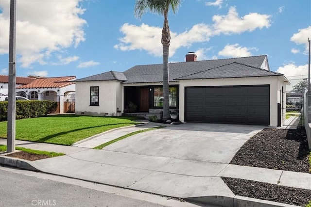 8620 S 4th Ave, Inglewood, CA 90305 - view of front of property with stucco siding, a garage, driveway, a gate, and a chimney
