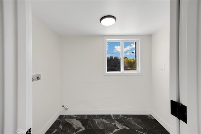 8620 S 4th Ave, Inglewood, CA 90305 - washroom with washer hookup, dark marble finish floors, and baseboards