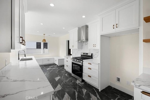 8620 S 4th Ave, Inglewood, CA 90305 - kitchen with gas stove, wall chimney exhaust hood, a sink, dark marble finish floors, and recessed lighting
