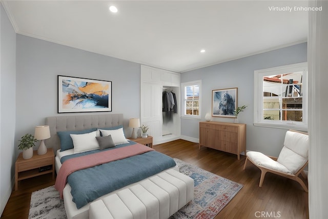 8620 S 4th Ave, Inglewood, CA 90305 - bedroom with crown molding, wood finished floors, recessed lighting, a closet, and baseboards