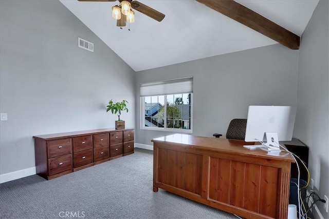 carpeted home office featuring visible vents, ceiling fan, lofted ceiling with beams, and baseboards