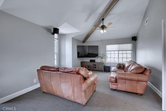 carpeted living room with visible vents, ceiling fan, vaulted ceiling with beams, and a healthy amount of sunlight