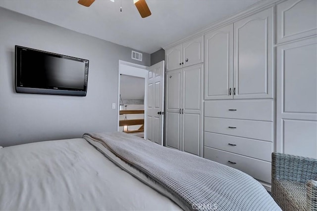 bedroom featuring a closet, a ceiling fan, and visible vents